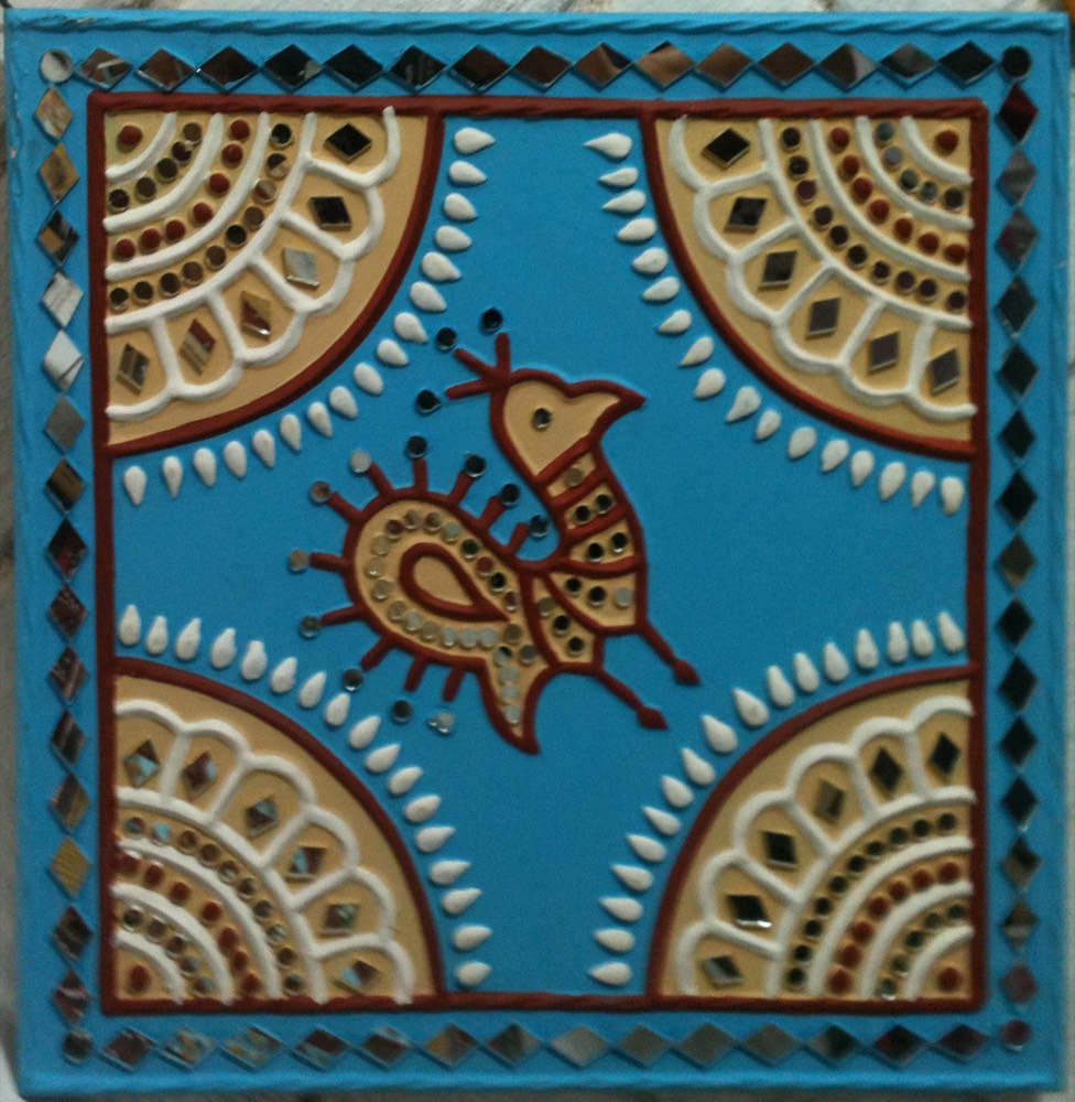 Blue mud art with red design