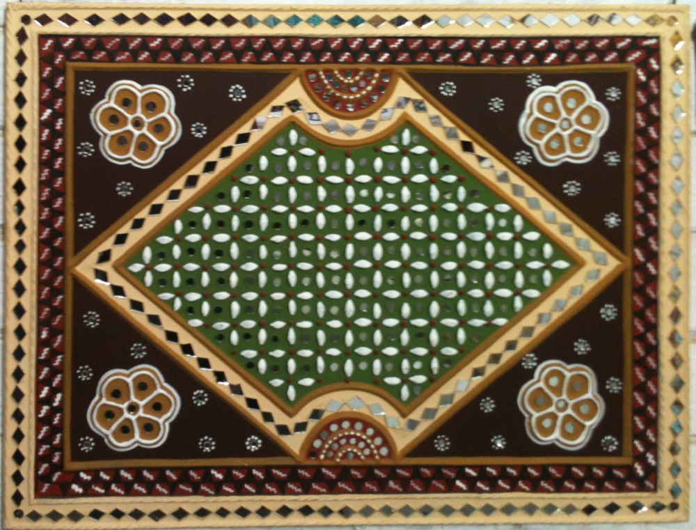 Green design mud art in brown color
