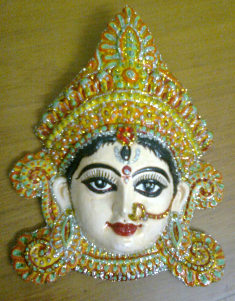 mask with gold jewellery