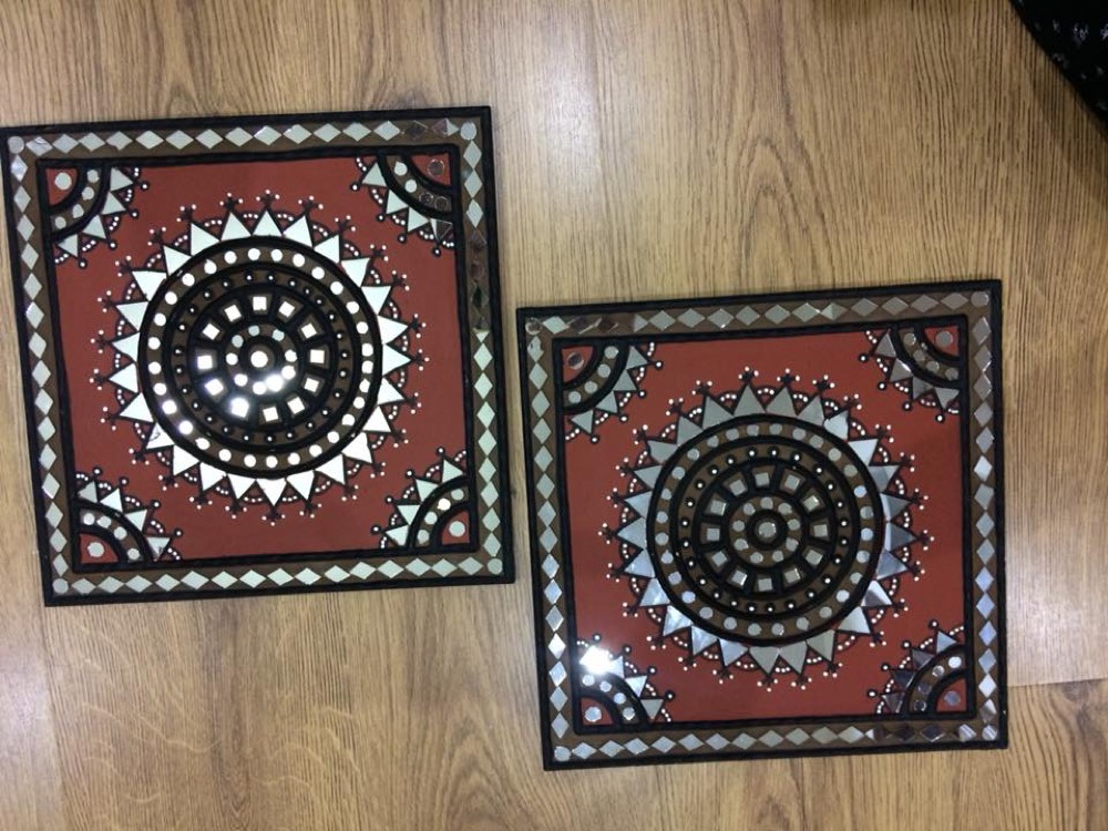 Red and black mud art