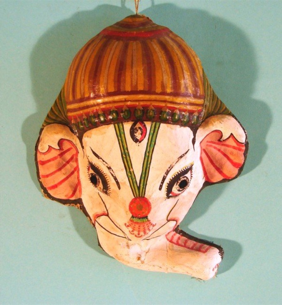 white and orange ganpati