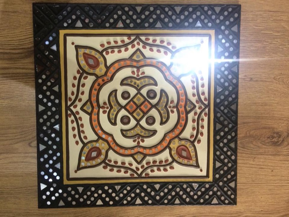 White mud art with red boder